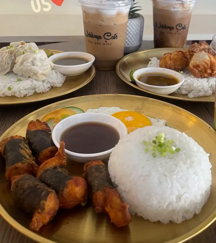A rice meal with grilled liempo, karaage and gravy